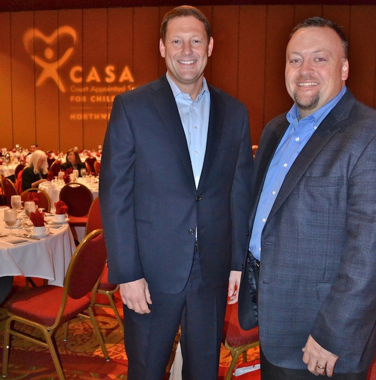 (from left) Charles Redfield and Adam Dill. Redfield is executive vice president for U.S. foods for Walmart and was keynote speaker for the Light of Hope breakfast. Dill is vice president, zone sales for General Mills and was honorary chair for the event.