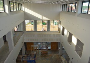 A view from the third floor and down into a portion of the eastern end of the main lobby where students are likely to gather between classes.