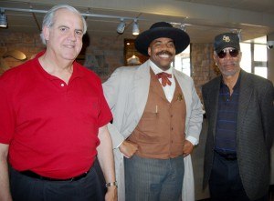 (Center) Legendary U.S. Marshal Bass Reeves — portrayed by Baridi Nkokheli of Fort Smith — visited Saturday (April 3) with legendary and Academy Award winning actor Morgan Freeman (right) about the plans to build a Bass Reeves statue in Fort Smith. The two met in Little Rock in April 2010.