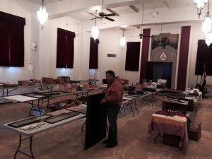 Four long rows of tables holds some of the documents, pictures and other items building owner Lance Beaty (pictured) hopes to organize and make available to the public.