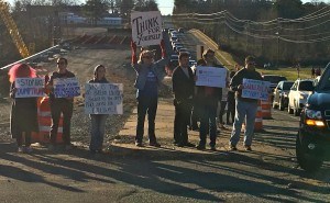 An estimated 75 protesters gathered outside Barton Coliseum in Little Rock on Wednesday (Feb. 3) ahead of a speech by GOP presidential candidate Donald Trump.