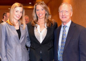 (from left) Sarah Gillmer, Neile Jones and Butch Jones, all with 8th and Walton, sponsors of the event.