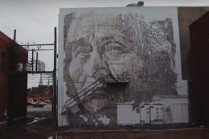 This mural by Vhils is in the Garrison Commons area, and was installed during the 2015 murals festival in downtown Fort Smith.