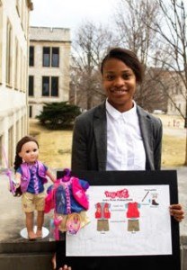 India Callahan, apparel merchandising student at the University of Arkansas, displays her My Doll fishing activewear garment she pitched to Walmart toy buyers last year. Her design was one of 14 that the retailer accepted and forwarded to its garment manufacturer in Vietnam for production. 