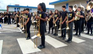 Members of the Darby Junior High School band prepare to play prior to the Darby statue unveiling ceremony.