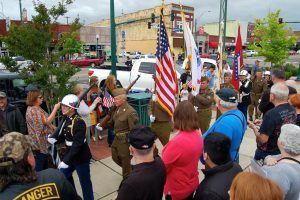 Members of the Fort Smith Public School ROTC program and members of the Second Ranger Infantry Battalion of St. Louis Living History Unit present the colors.