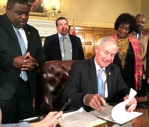 Gov. Asa Hutchinson signed the Arkansas Works bill into law Friday (April 8). Meeting in special session on Thursday, the House approved Arkansas Works, 70-30, while the Senate approved it, 25-10.