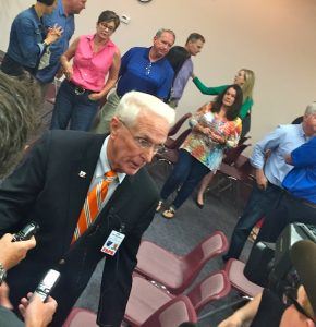 Jim Rowland, athletic director for the Fort Smith Public School District, speaks to the media Monday night after announcing his resignation.
