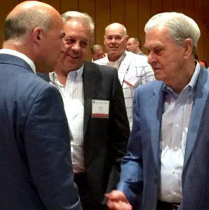 David Glass (far right), owner of the World Series Champions Kansas City Royals and former president and CEO of Wal-Mart Stores, visits with audience members at the 2016 Emerging Trends in Retail Conference held in Rogers on Tuesday (June 14).