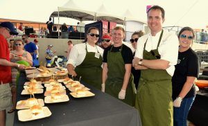 Matthew McClure, executive chef of The Hive, Lindsay Ortega, Zane Dearin, Trevor Meredity, Beth Waller, Matthew McClure and Erin Falkenstein served smoked pork bologna sandwiches to guests.