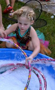 Children enjoyed making giant bubbles during the Firefly Fling.