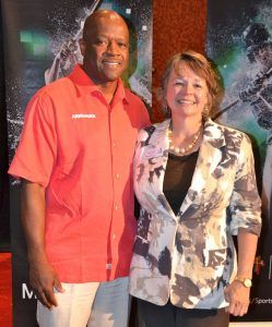 University of Arkansas head basketball coach Mike Anderson with Rhonda Fincher, founder and executive director of Kendrick Fincher Hydration for Life.