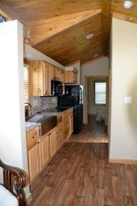 The kitchen inside an Eagle Home model. This tiny home is handicap-friendly.