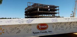The final beam was signed by hundreds of area residents before it was placed atop the steel structure at the Arkansas Children’s Hospital Northwest on Wednesday (Sept. 28).