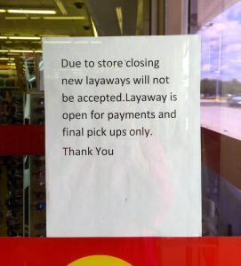 A sign in the K-Mart store in Springdale addresses the layaway policy for the closing store.
