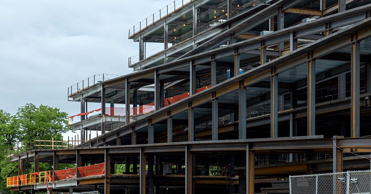 hub’ Ledger tops out in Bentonville; on schedule for early